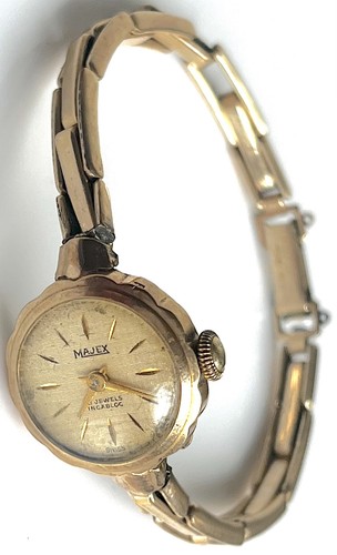 9ct gold cased majex - cased,