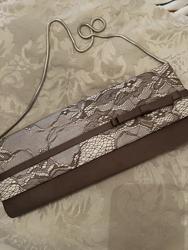 Clutch bag with chained - with,