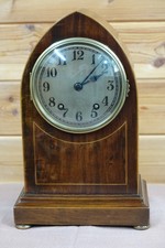 Edwardian Inlaid Lancet top clock by Newbridge Works of Bath.
