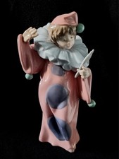 NAO Lladro girl clown figurine with a mirror, mint condition.