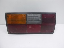 1986 VOLKSWAGEN TRANSPORTER T25 LEFT REAR/TAIL LIGHT ON BODY 251945111F