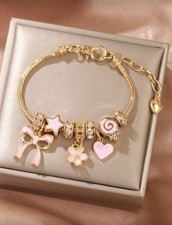 Gold Pink Charm Bracelet Bow