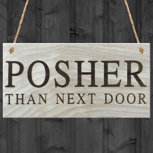 Posher than next door - than,