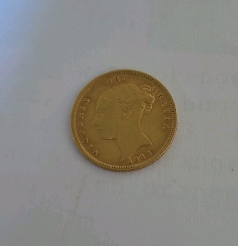 1883 half gold sovereign - half,