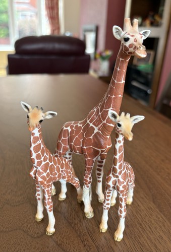 Schleich giraffe and - and, 2