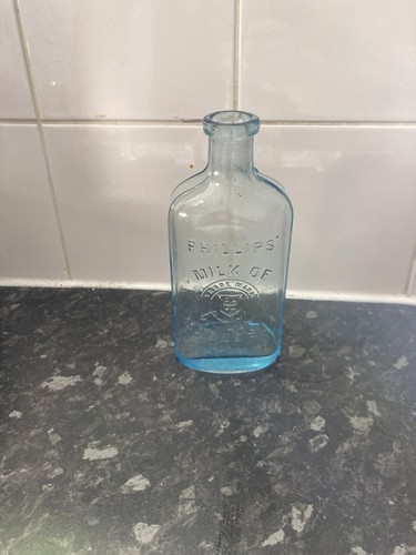 Vintage blue bottle milk of - vintage,