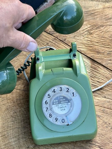Vintage green telephone 706 - telephone,