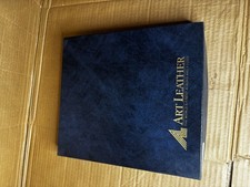 Art Leather stamp album set.