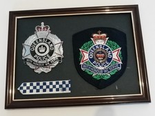 OBSOLETE QUEENSLAND POLICE SERVICE,CAP BADGE,PATCH & REMEMBERANCE RIBBON,FRAMED.