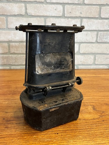 Antique iron clad lamp stove - clad,