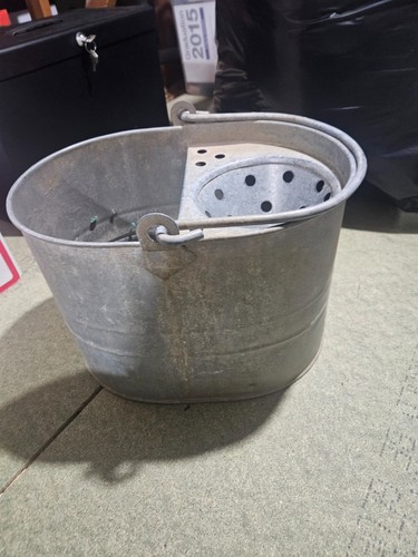 Old used galvanised - metal, mop