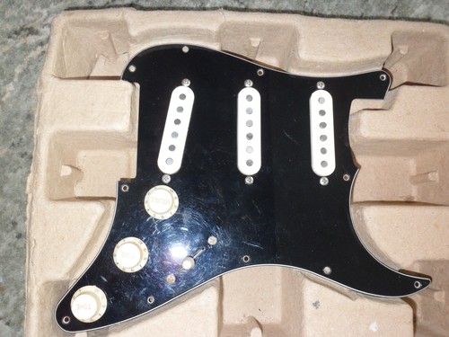 Loaded pickguard strat