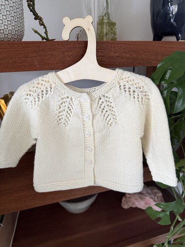 Hand knitted baby - hand,