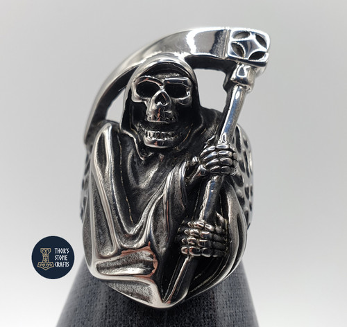 Grim reaper ring with - with, scythe