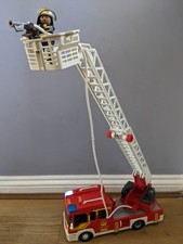 Playmobil fire engine with long moveable ladder and hose, lights, figures, tools