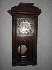 Old wall clock pendulum clock