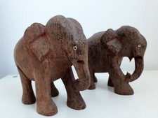 Vintage pair of wood elephants