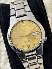 Seiko 5 Automatic Men’s Watch 21 Jewels Gold Sunburst Dial Day Date Japan