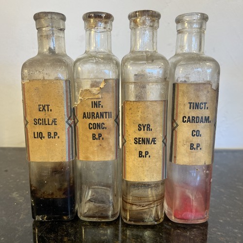 Antique chemist bottles - chemist,