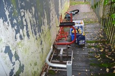 Contents of Motorcycle Workshop Stands Oil Exhaust Extractor Fan Parts Bins etc.