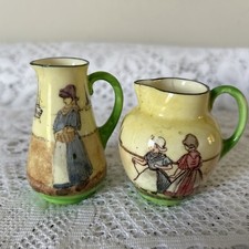 2 Royal Doulton Dutch Harlem Art Deco Noke Designed Miniature Jugs