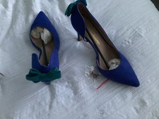 pair of blue jade heeled