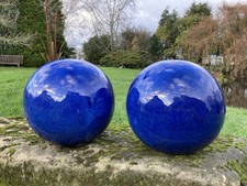 PAIR OF BLUE GLAZED TERRACOTTA GATE POST FINIALS