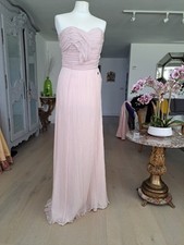 Glamorous Galliano, a fabulous red carpet dress with real Hollywood panache