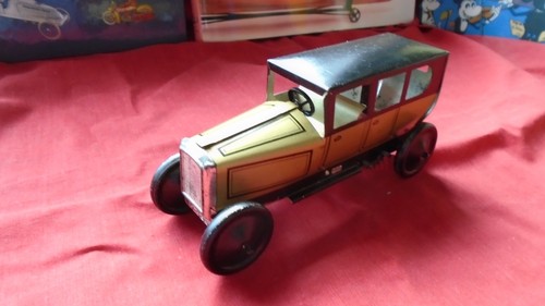 Burnett tinplate clockwork - tinplate,