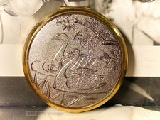 Swans silver and gold tone