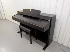 Yamaha Clavinova CLP-330 Digital Piano and stool in dark rosewood stock #25510