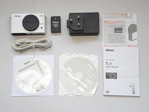 Boxed nikon camera body - 1, j1