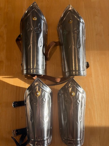 Medieval arm guards and leg - guards,