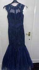 This dress is a navy blue lace
