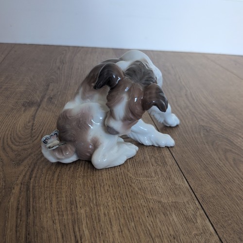 Lladro dog and butterfly - lladro,