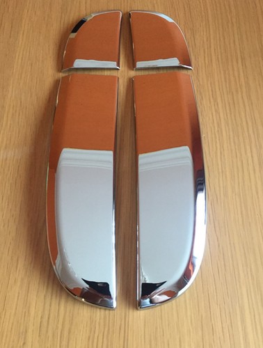 Chrome side vent wing trim - side,