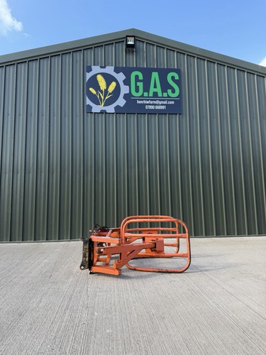 Pin and cone bale squeeze - and,