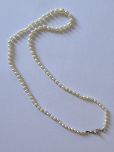 Mikimoto gold clasp - ct,