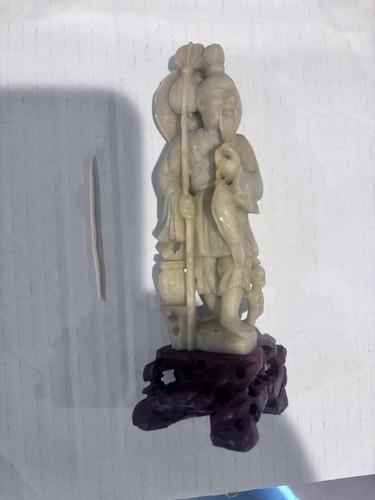 Hand carved soapstone man - hand, of