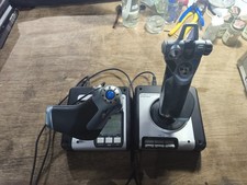 A Pair Of Saitek X52 Throttle & Joystick Flight Controllers With Linking Cable