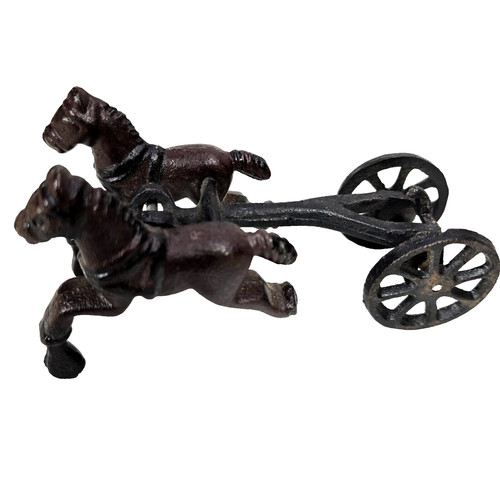 Antique cast iron horses pull - horses,