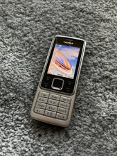 Nokia 6300 Mobile Phone Silver Orange