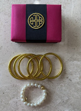 Budhagirl All Weather Gold Bangles (Set of 5) + White Pearl Mala Beaded Bracelet