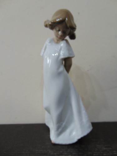 Nao lladro porcelain - by,
