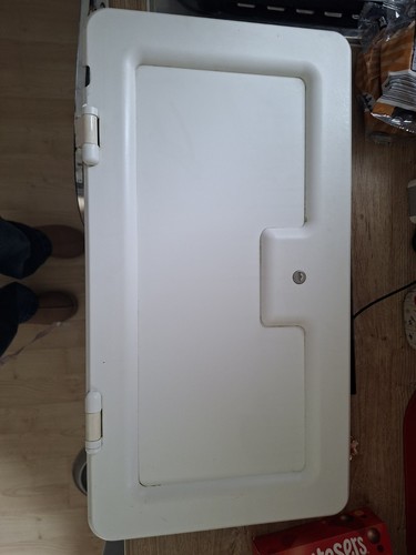 Battery access locker door - battery,