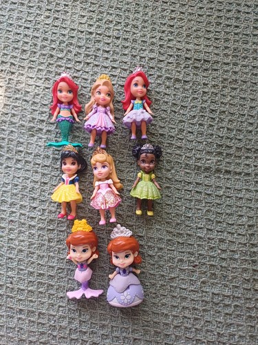Disney small dolls - small,