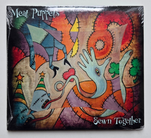 Meat puppets sewn together - -,