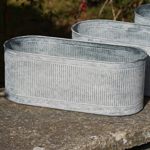 Large ribbed metal planters - ribbed,