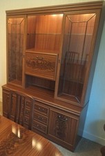 A Regency style reproduction yew wood display cabinet, 7 Cupboards, 3 Drawers