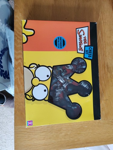 The simpsons chess set - the,